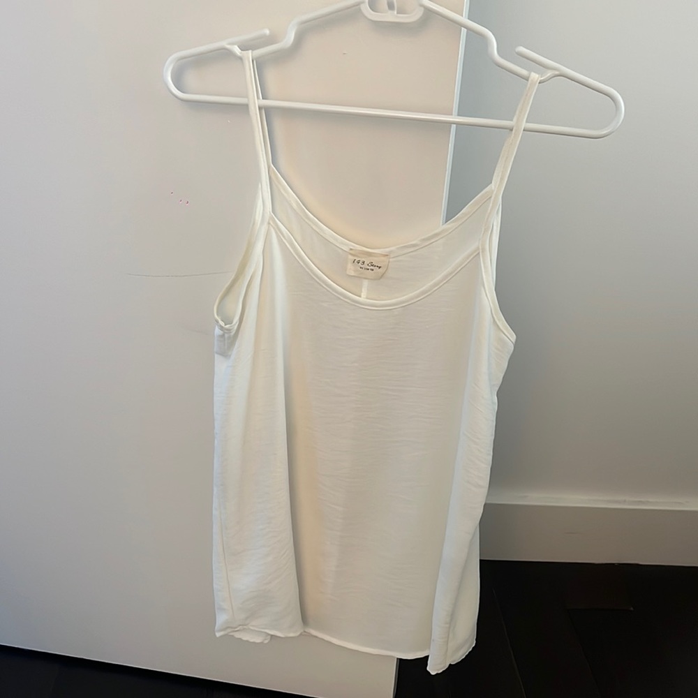 143 Story by Line Up white tank top.